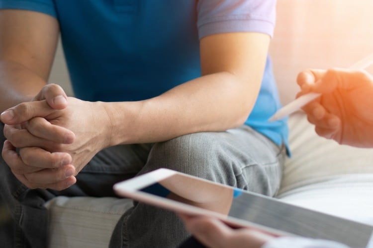 Man sitting in doctor's office